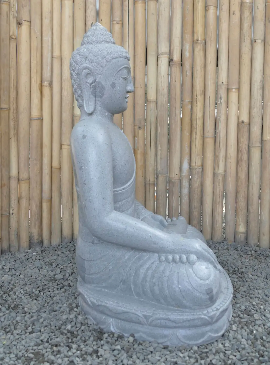  Product image 5 of the product “Seated Buddha made of Riverstone in Bhumisparsha - gesture of touching the earth. 86cm height. ”